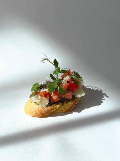 Bruschetta Pomodoro canapé on the current baguette base.